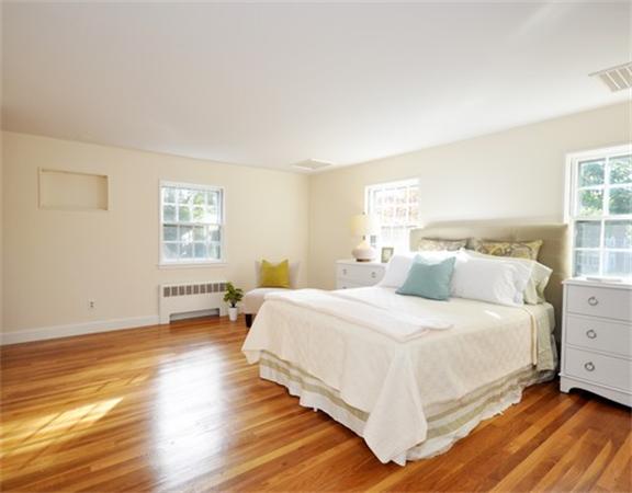 292 Musketaquid Road Concord, MA 01742 - Photo 12 of 28 a bedroom with a bed and a window