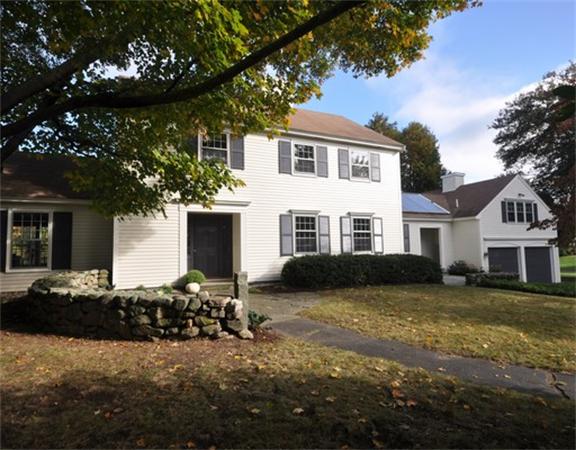 292 Musketaquid Road Concord, MA 01742 - Photo 22 of 28 a view of a house with a yard