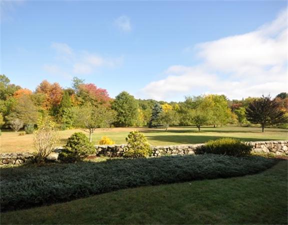 292 Musketaquid Road Concord, MA 01742 - Photo 27 of 28 a view of a lake with a yard