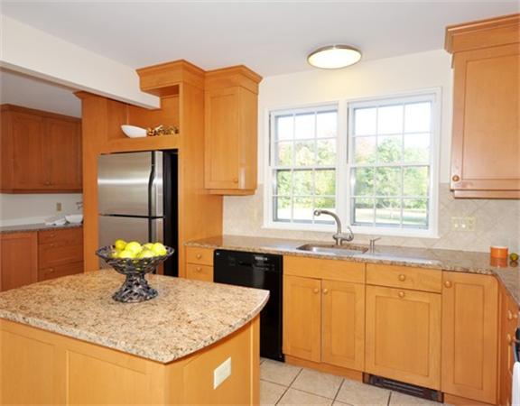 292 Musketaquid Road Concord, MA 01742 - Photo 6 of 28 a kitchen with a sink cabinets and window
