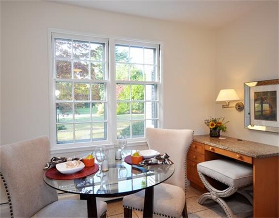 292 Musketaquid Road Concord, MA 01742 - Photo 9 of 28 a living room with furniture and a window