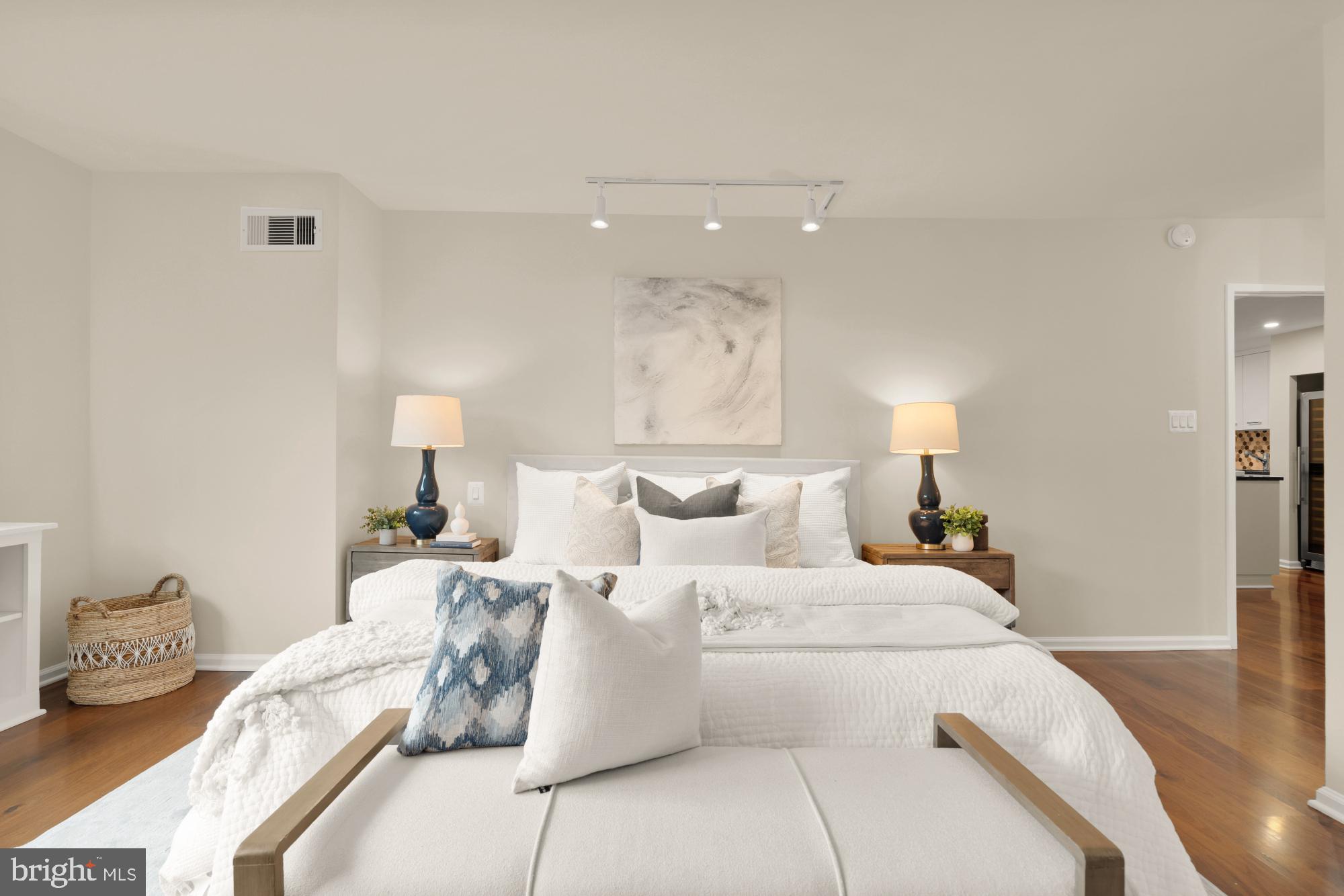 2555 Pennsylvania Avenue Northwest, Unit 617 & 618 Washington, DC 20037 - Photo 31 of 56 a large white bed in a white room