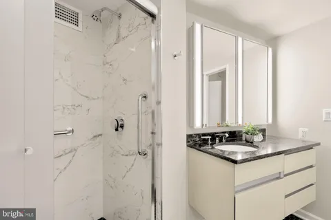 a large white bed in a white room