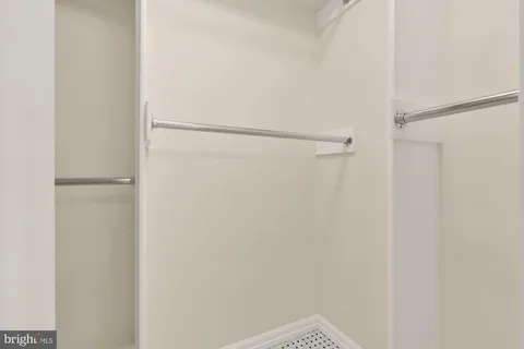 a view of a building with sitting area