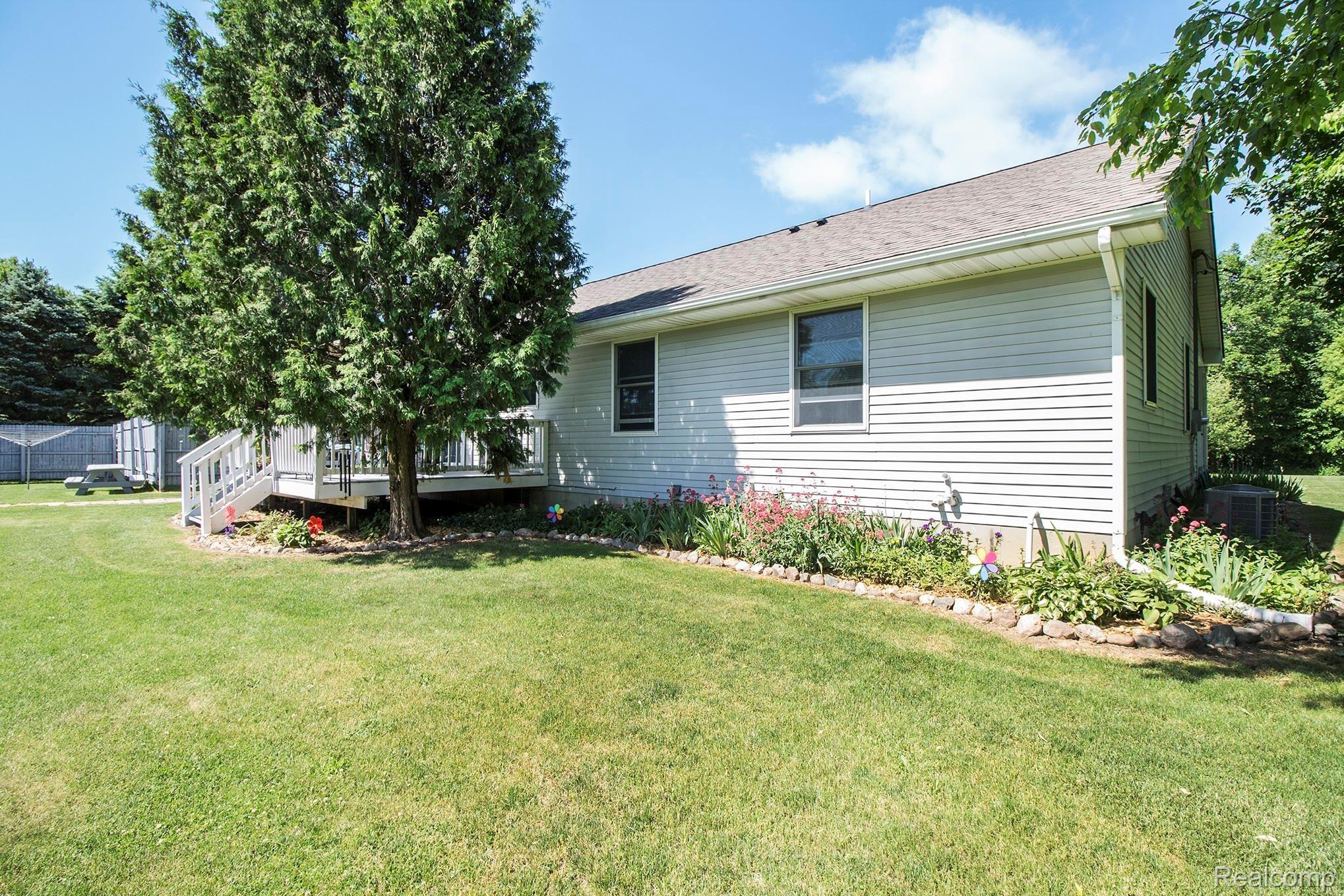 77 Kane Road South Webberville, MI 48892 - Photo 22 of 38 Mature Flowers and Landscaping