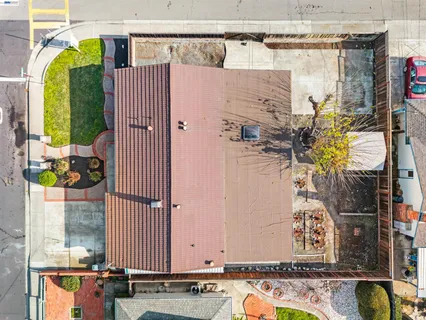 a view of a house with swimming pool and a yard