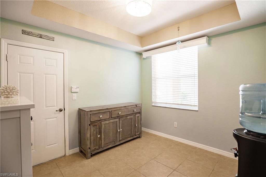 2104 Par Drive Naples, FL 34120 - Photo 12 of 26 a view of a kitchen with closet area