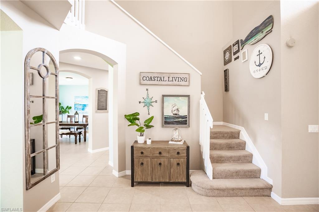 2104 Par Drive Naples, FL 34120 - Photo 16 of 26 a view of lobby with furniture and wooden floor