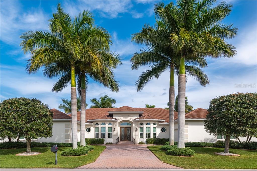 PREMIER LUXURY WATERFRONT ESTATE HOME WITH QUICK ACCESS TO CHARLOTTE HARBOR LEADING TO THE GULF OF MEXICO VIA PONCE INLET!