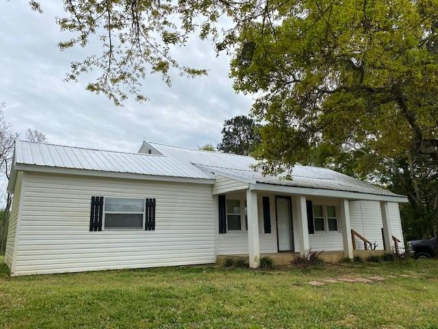 10340 Lavonia Road Carnesville, GA 30521 - Photo 1 of 1 a front view of a house with a yard