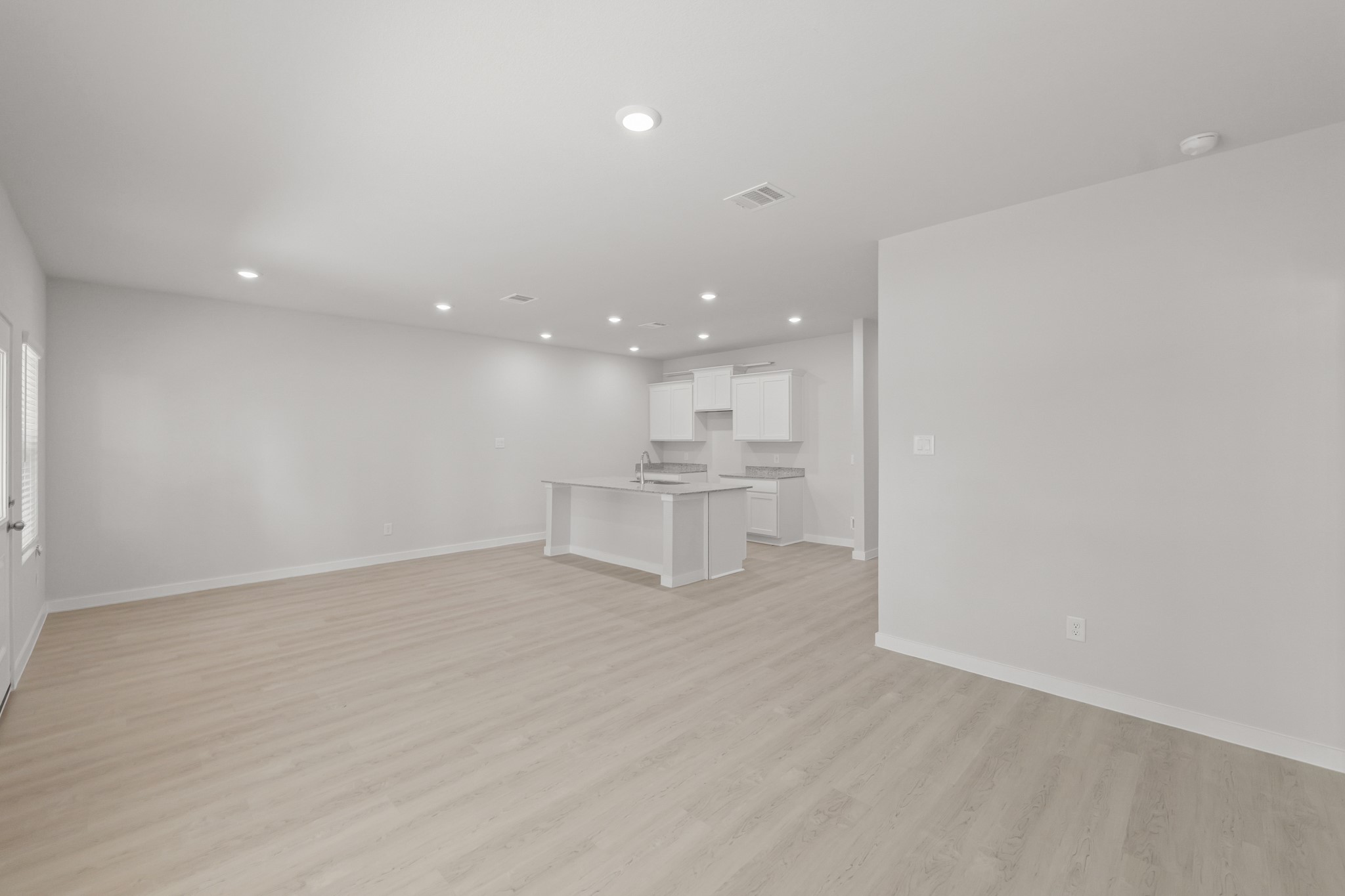 4414 Albritton Avenue Bryan, TX 77845 - Photo 10 of 34 a view of an empty room with a kitchen