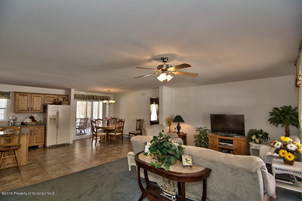 2744 Boulder Road Lake Ariel, PA 18436 - Photo 20 of 47 a living room with furniture and a flat screen tv