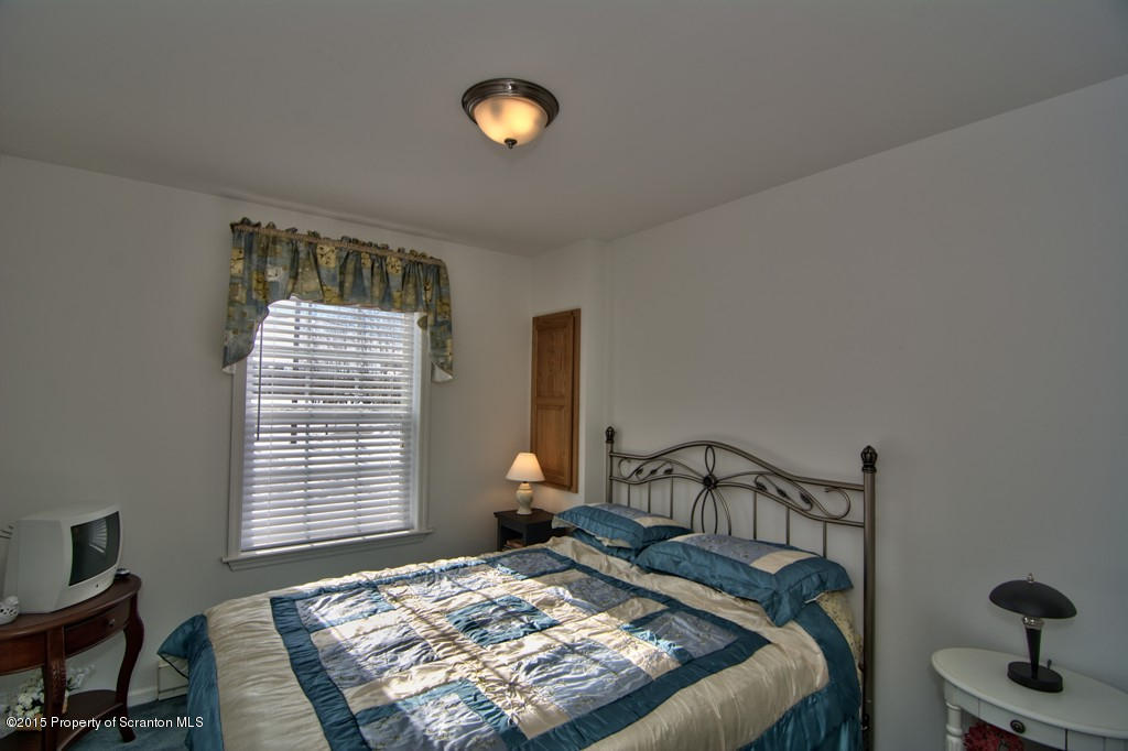 2744 Boulder Road Lake Ariel, PA 18436 - Photo 40 of 47 a bed sitting in a bedroom next to a window
