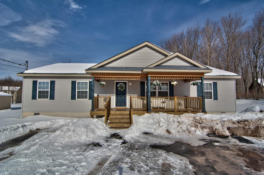 2744 Boulder Road Lake Ariel, PA 18436 - Photo 47 of 47 a front view of a house with a yard