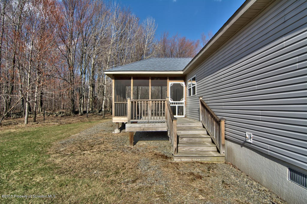 2744 Boulder Road Lake Ariel, PA 18436 - Photo 5 of 47 a view of a house with a yard