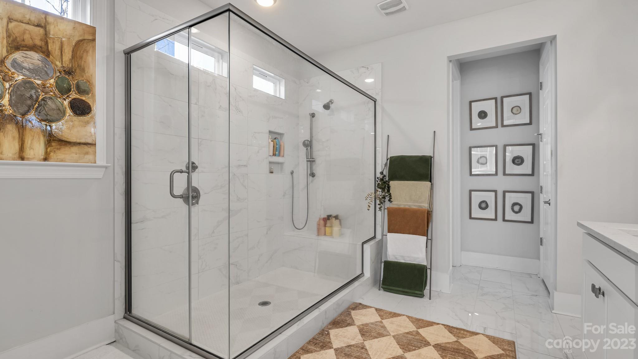 5351 Fewell Road Clover, SC 29710 - Photo 16 of 27 a bathroom with a glass shower door