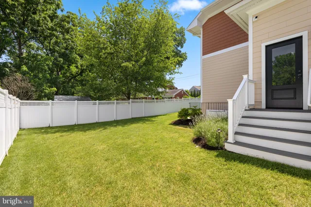 a view of backyard with green space