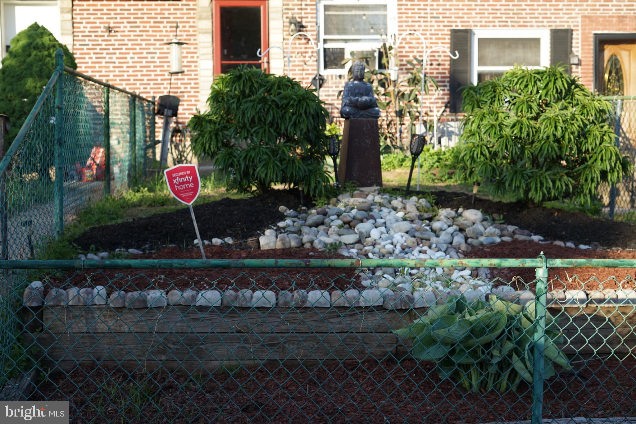 735 Grant Road Folcroft, PA 19032 - Photo 1 of 39 Charming garden oasis with stone path.
