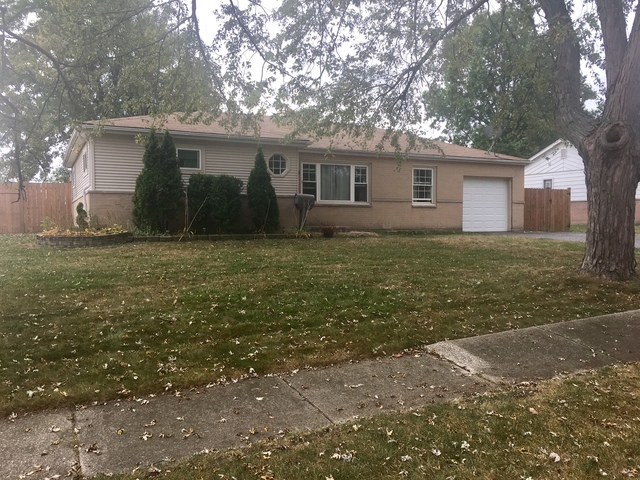 a house view with a garden space