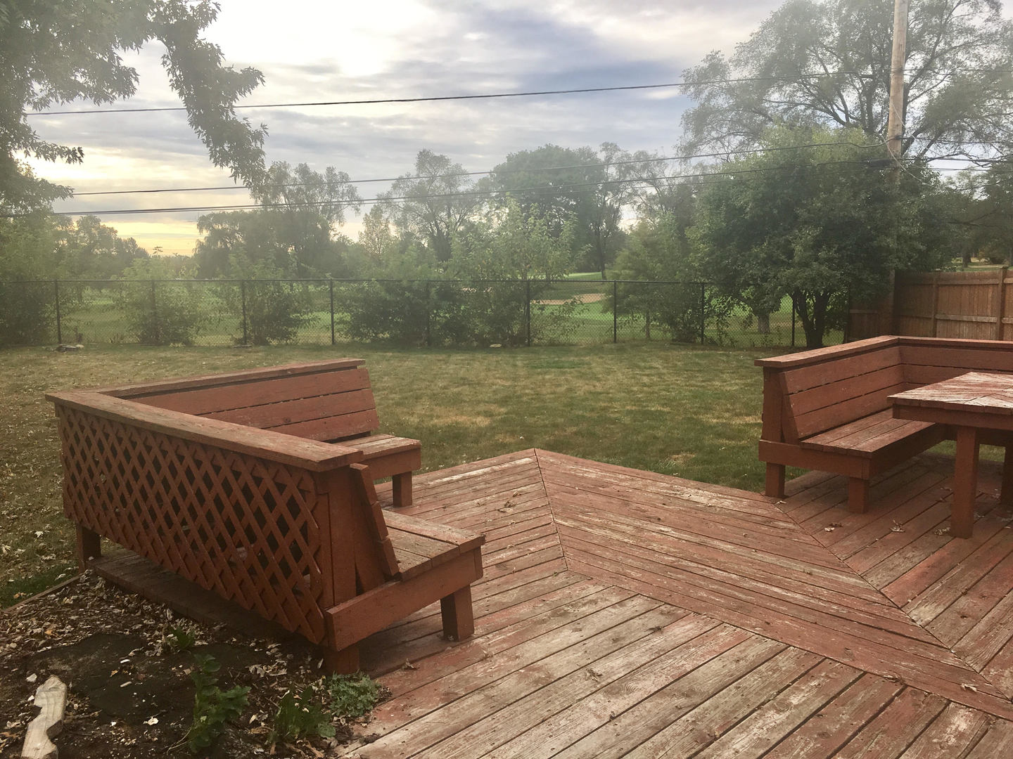45 Bradley Lane Hoffman Estates, IL 60169 - Photo 12 of 12 a view of a roof deck with couches and wooden floor