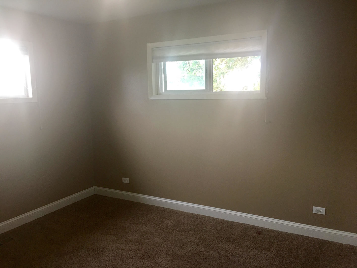 45 Bradley Lane Hoffman Estates, IL 60169 - Photo 7 of 12 an empty room with a window