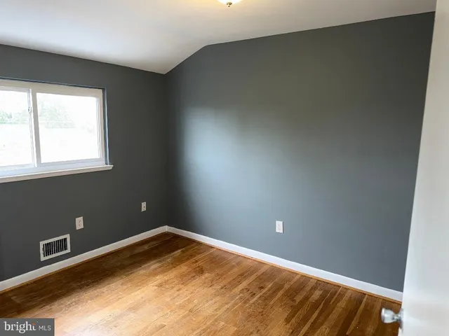 a view of a room with a window