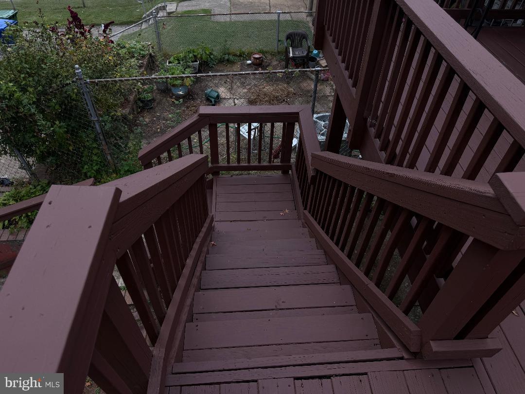 645 Queensgate Road Baltimore, MD 21229 - Photo 20 of 21 a view of balcony with wooden floor