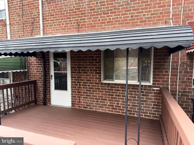 a view of a brick building with a window