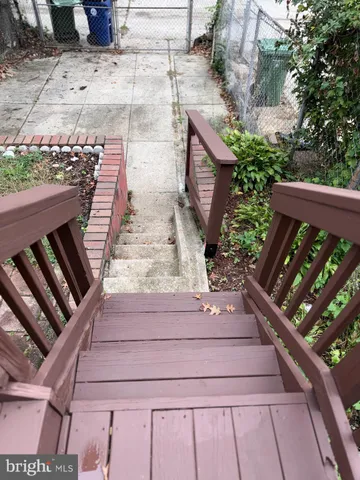 a view of stairs and yard