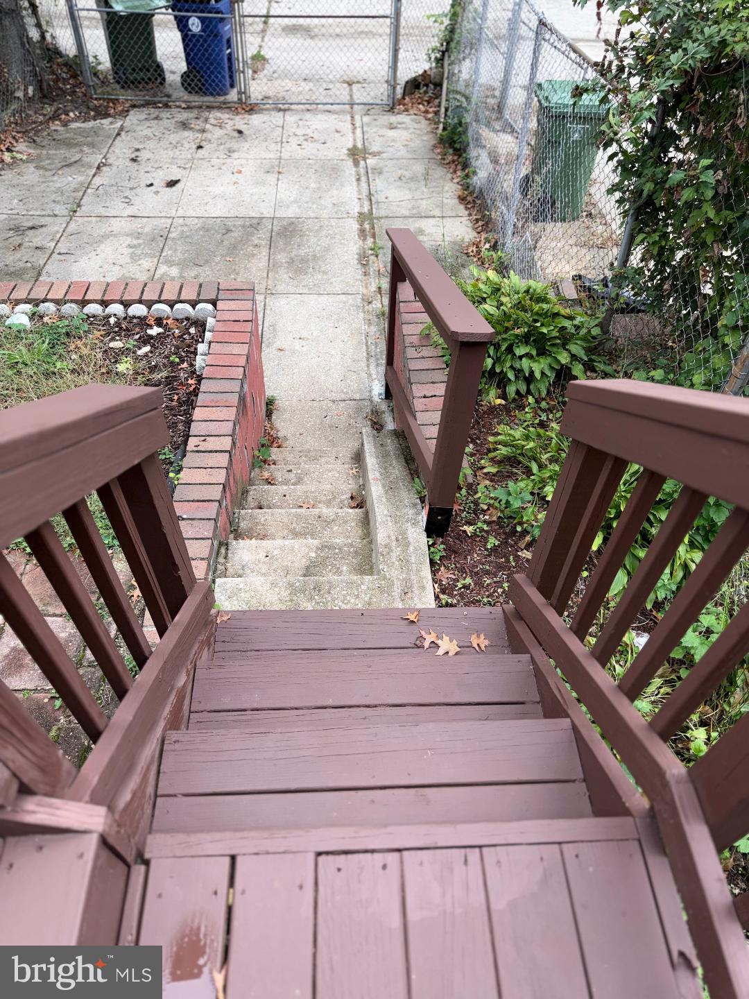 645 Queensgate Road Baltimore, MD 21229 - Photo 21 of 21 a view of stairs and yard