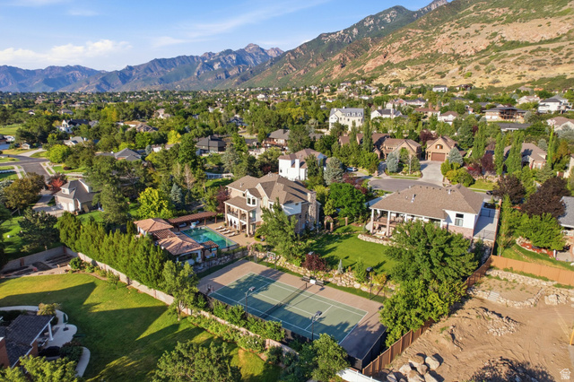 12308 Mariah Circle Draper, UT 84020 - Photo 262 of 293 Back of both residences Expansive property featuring a multi-story residence, private swimming pool, full-size tennis court, and mature landscaping