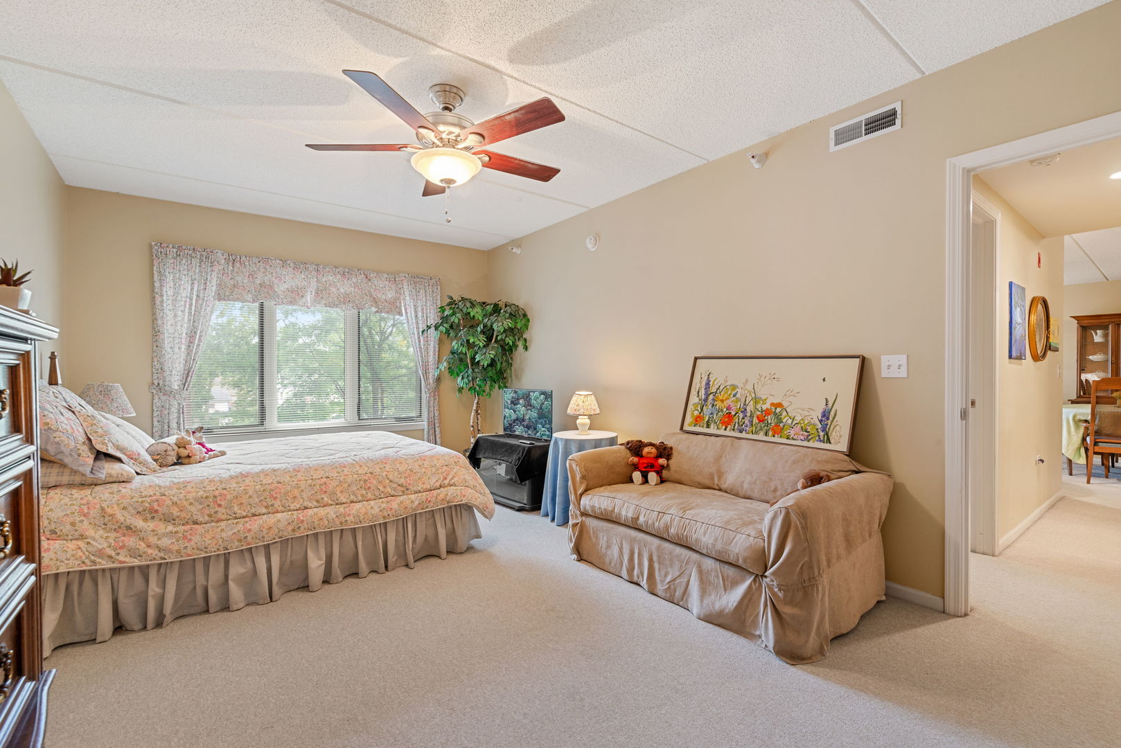 225 Main Street, Unit 201 Roselle, IL 60172 - Photo 13 of 21 a bedroom with two beds and windows
