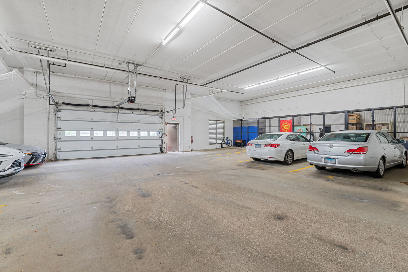 225 Main Street, Unit 201 Roselle, IL 60172 - Photo 20 of 21 a car parked in a parking space