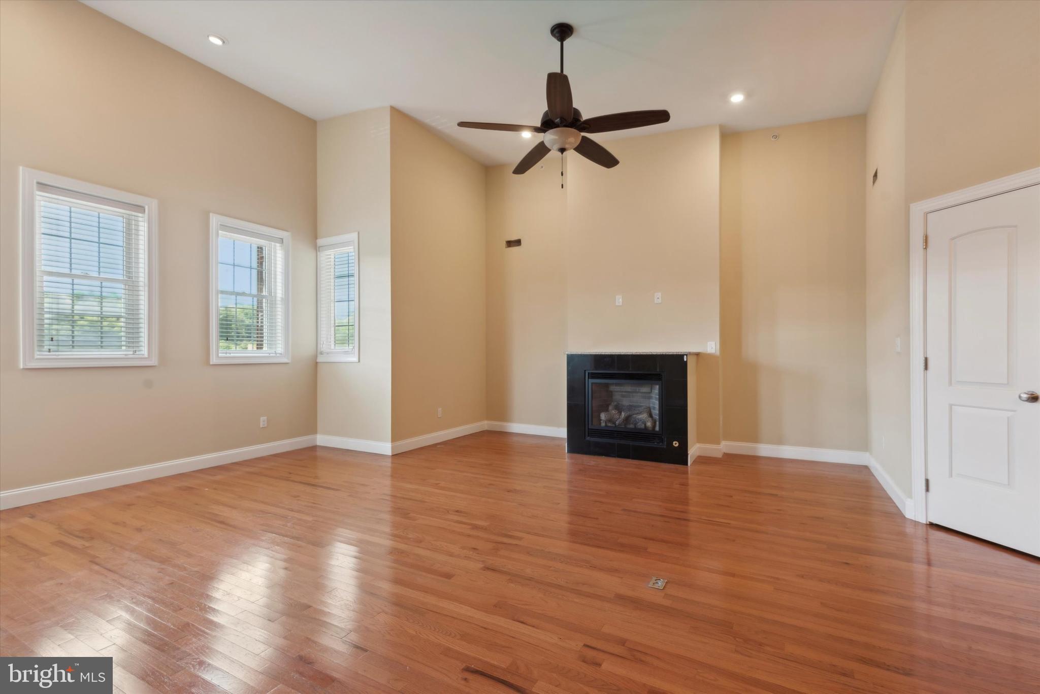 4151 Cresson Street, Unit 3F Philadelphia, PA 19127 - Photo 2 of 15 a view of empty room with wooden floor and fan