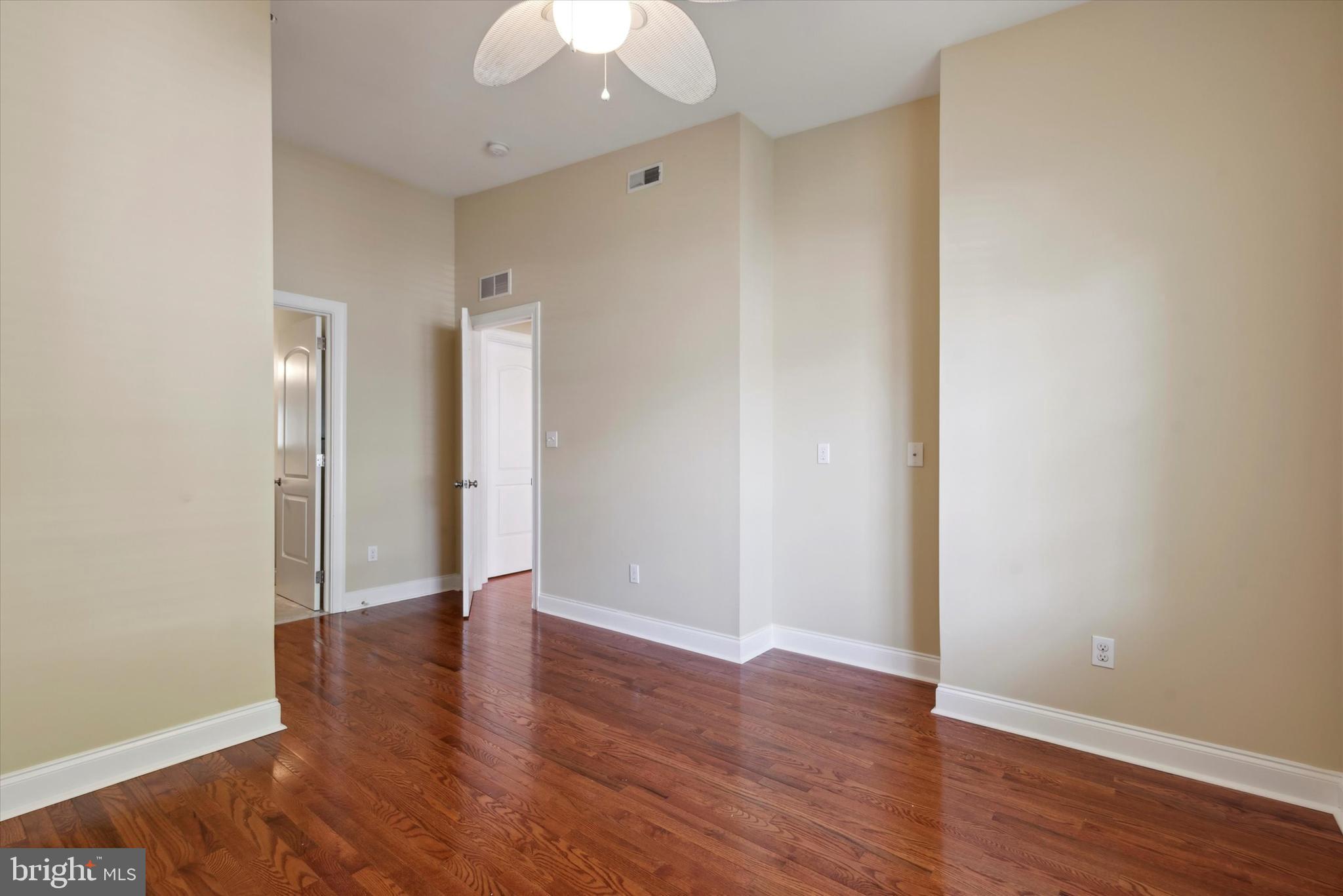 4151 Cresson Street, Unit 3F Philadelphia, PA 19127 - Photo 9 of 15 a view of an empty room with wooden floor