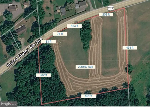 an aerial view of balcony and yard