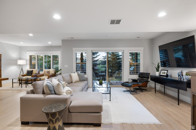1737 East Viewside Circle Hideout, UT 84036 - Photo 16 of 35 Spacious living area featuring light wood-finish flooring, recessed lighting, and light gray wall paint
