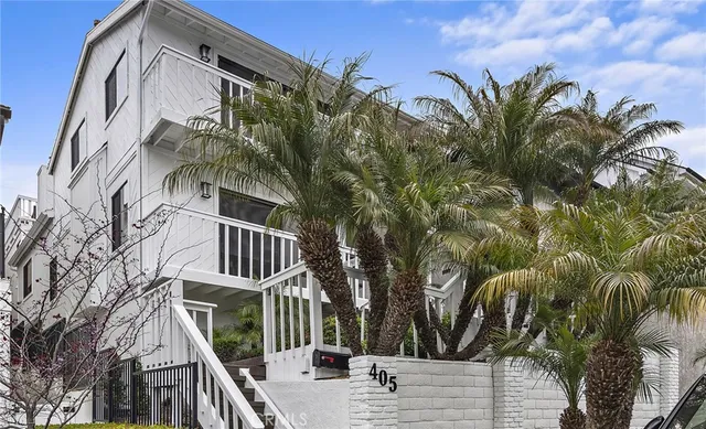 a view of a house with a tree