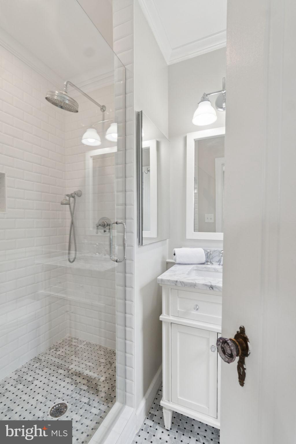 2737 Devonshire Place Northwest, Unit 503 Washington, DC 20008 - Photo 23 of 49 a bathroom with a shower