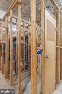 a view of a patio with table and chairs and potted plants