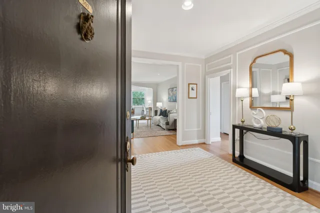 a en suite bathroom with a sink a mirror and shower