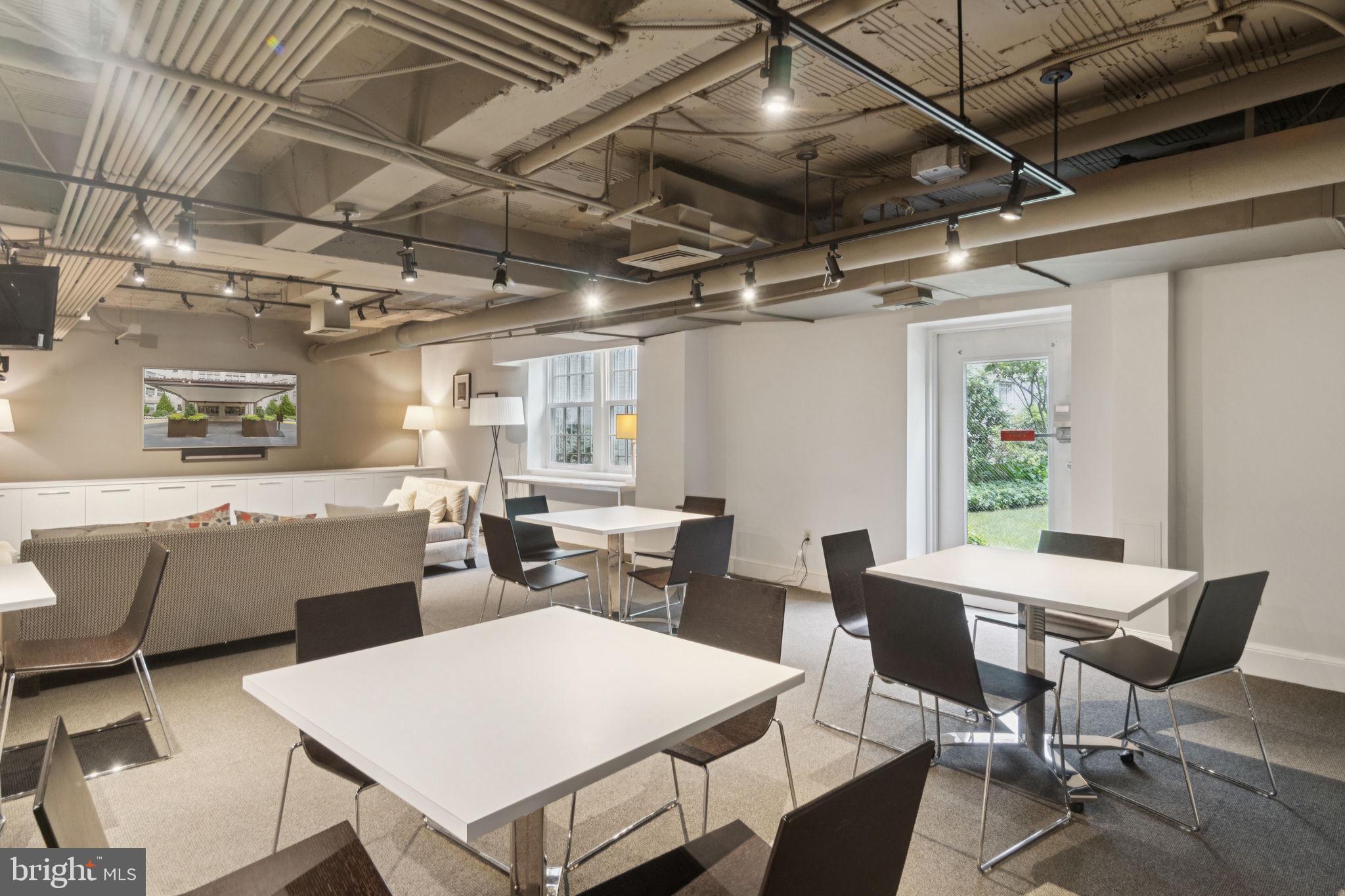 2737 Devonshire Place Northwest, Unit 503 Washington, DC 20008 - Photo 35 of 49 a view of a dining room with furniture window and outside view