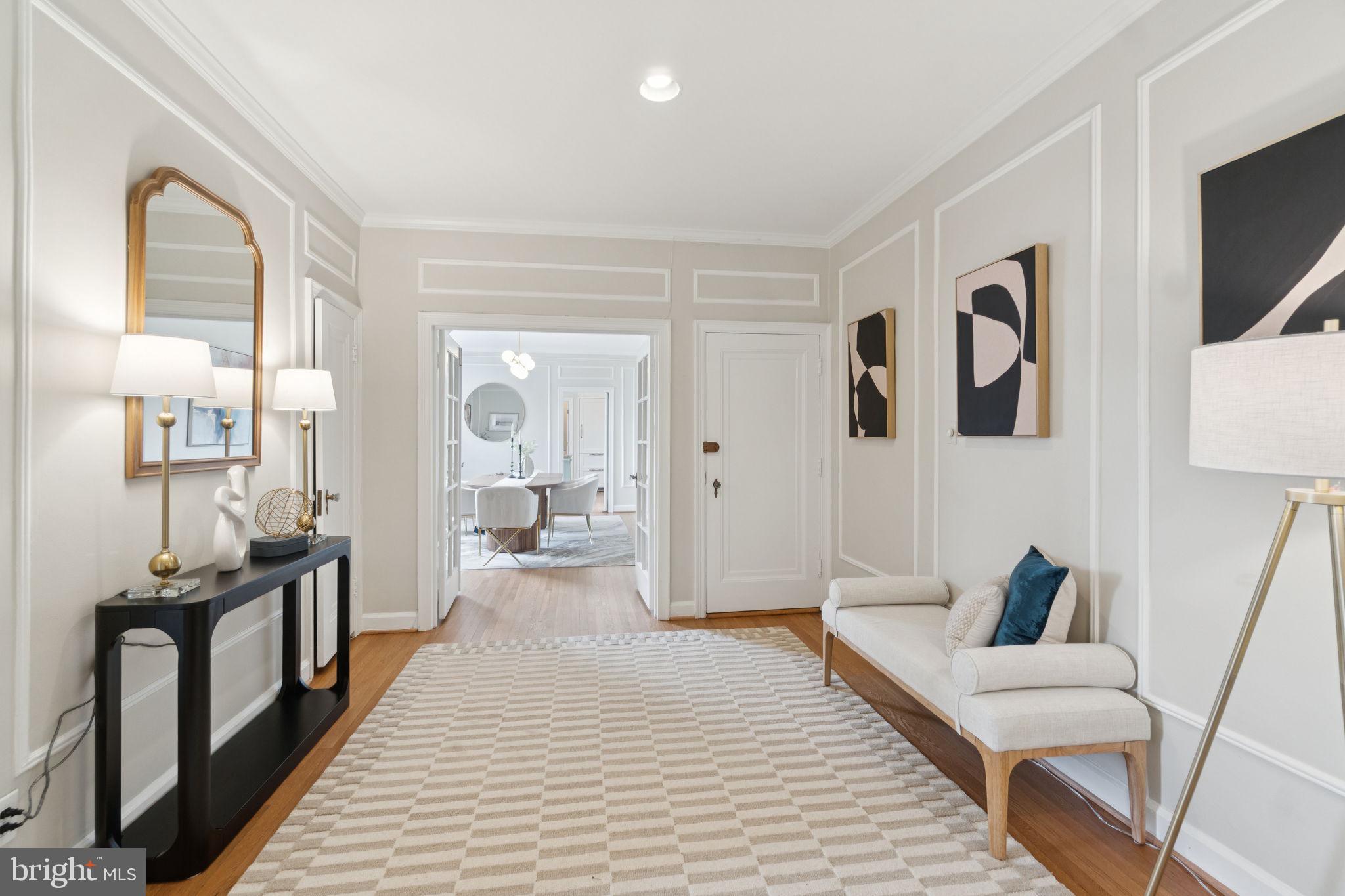 2737 Devonshire Place Northwest, Unit 503 Washington, DC 20008 - Photo 4 of 49 a spacious bedroom with a large bed and a couch