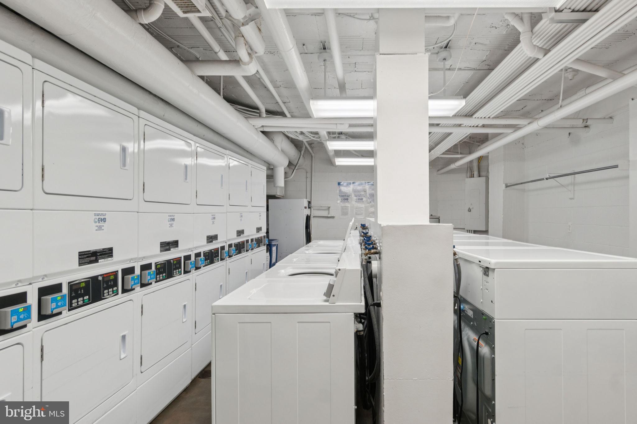 2737 Devonshire Place Northwest, Unit 503 Washington, DC 20008 - Photo 42 of 49 a utility room with dryer and washer