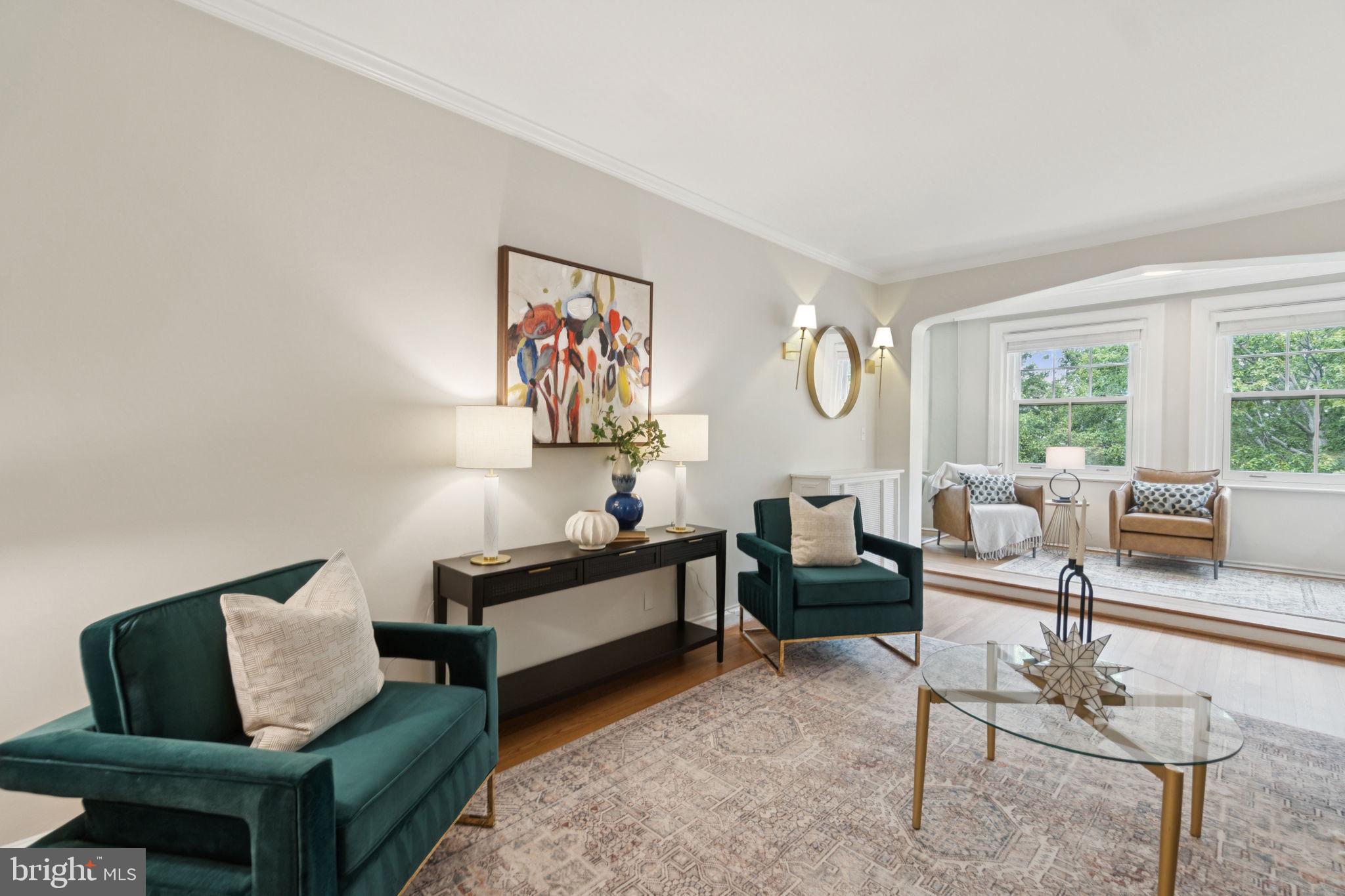 2737 Devonshire Place Northwest, Unit 503 Washington, DC 20008 - Photo 7 of 49 a living room with furniture and a large window