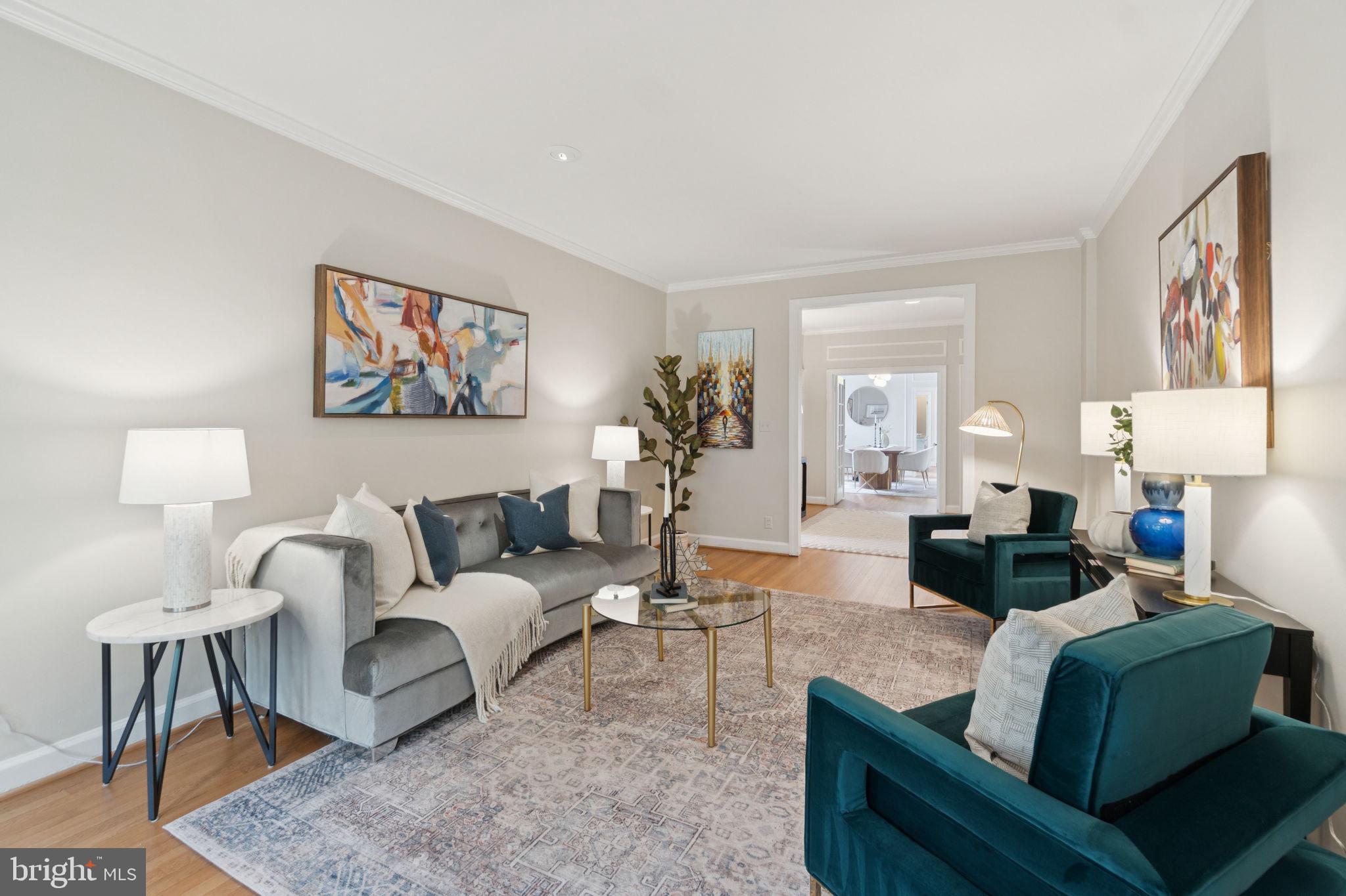 2737 Devonshire Place Northwest, Unit 503 Washington, DC 20008 - Photo 9 of 49 a living room with furniture and a large window