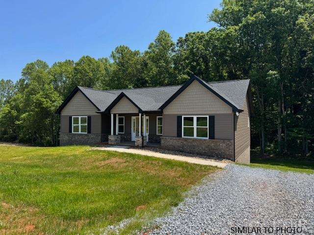 600 Stratford Road Concord, VA 24538 - Photo 3 of 15 a front view of a house with a yard