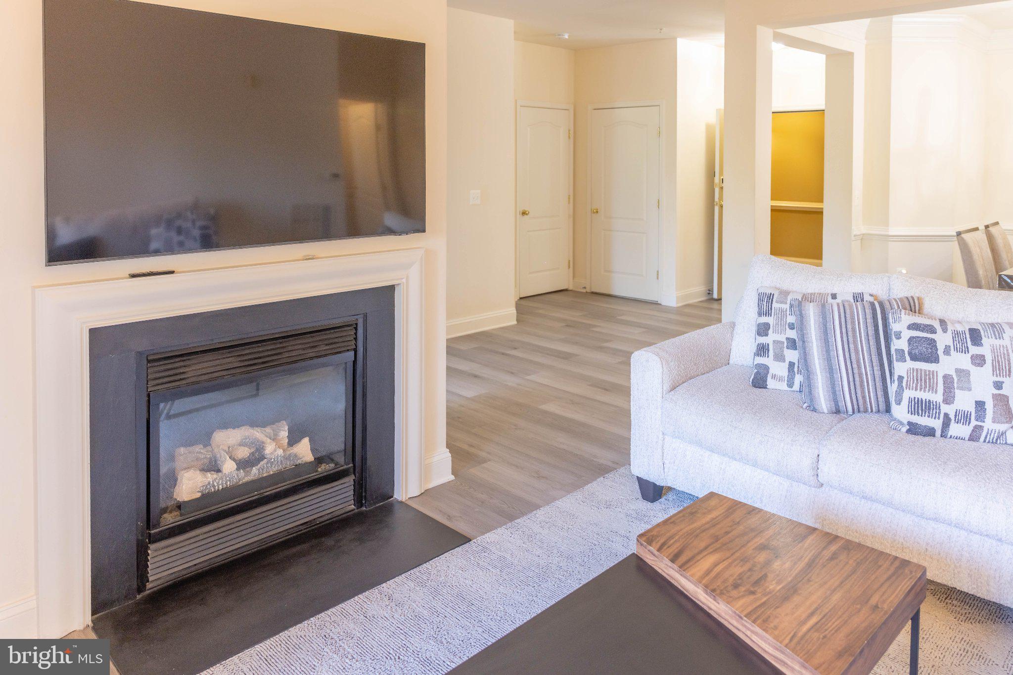 12824 Clarksburg Square Road, Unit 105 Clarksburg, MD 20871 - Photo 27 of 96 Cozy living space with modern charm.