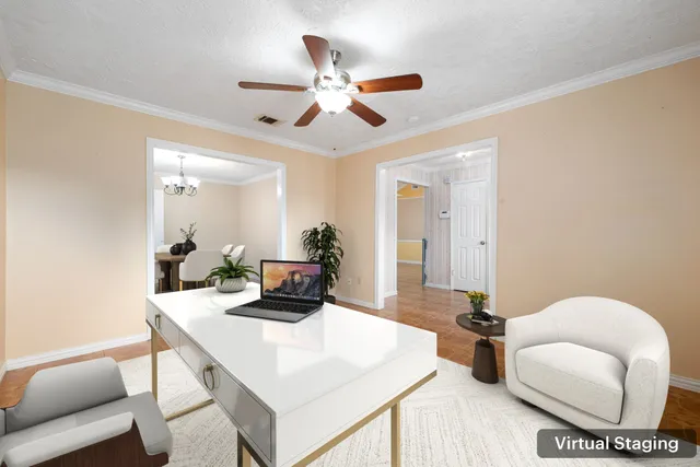 a living room with furniture and a large mirror