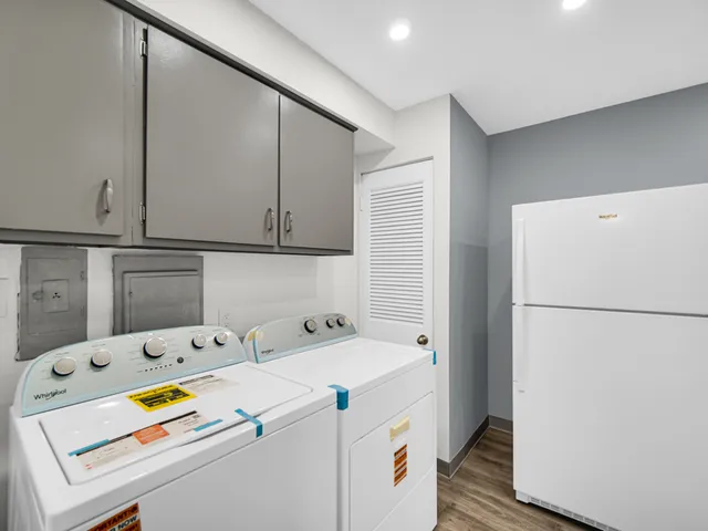 a utility room with dryer and washer